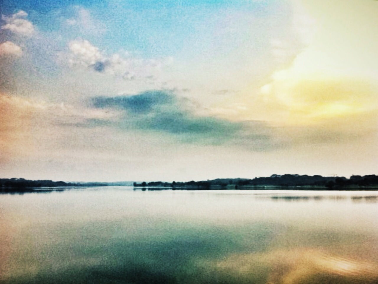 water, tranquil scene, sky, tranquility, scenics, sunset, beauty in nature, reflection, waterfront, cloud - sky, lake, nature, idyllic, cloud, cloudy, sea, calm, outdoors, dusk, no people