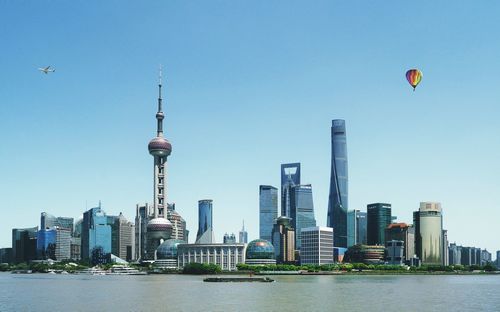 View of modern buildings against clear sky