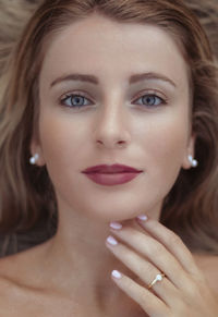 Close-up portrait of young woman