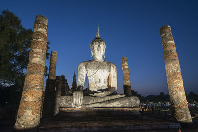 Low angle view of old temple against sky