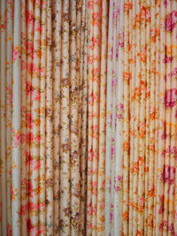 Full frame shot of floral pattern fabrics for sale in shop