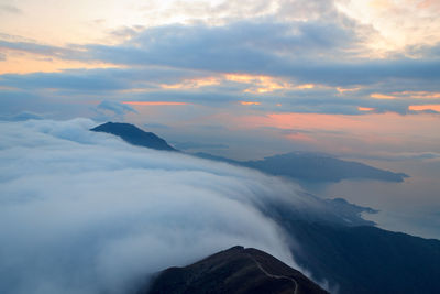 Scenic view of mountains against sky during sunset