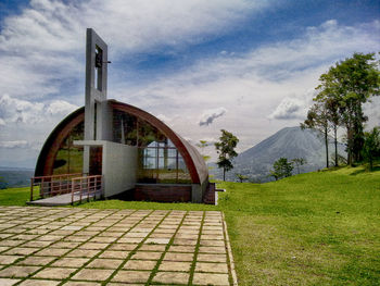 Built structure against cloudy sky