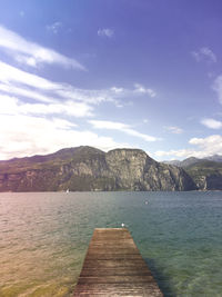 Pier over sea against sky