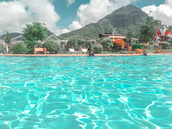 Scenic view of swimming pool against mountains