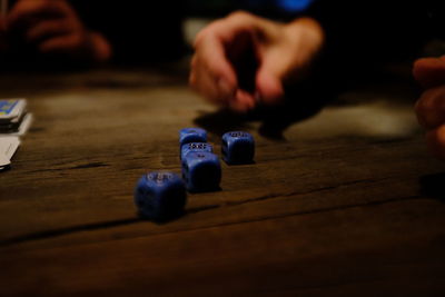 Close-up of hands on table