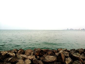 Scenic view of sea against clear sky