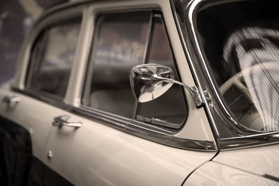 Close-up of car on side-view mirror