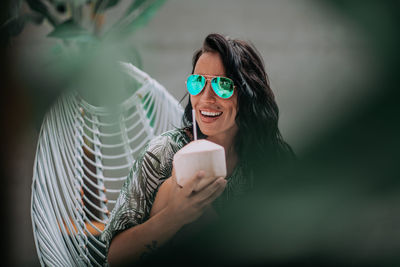 Young woman drinking coffee cup