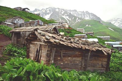 Low angle view of houses on mountain