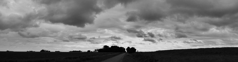 View of landscape against cloudy sky