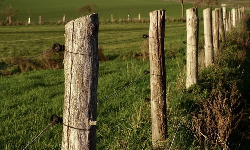 View of wooden fence on field