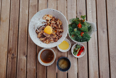 High angle view of breakfast served on table