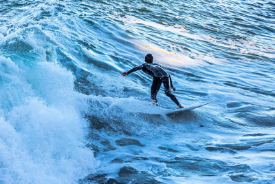 Man surfing in sea