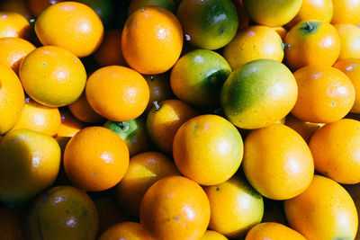 Full frame shot of oranges in market