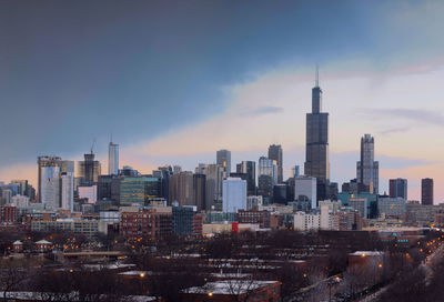 View of cityscape against sky during sunset