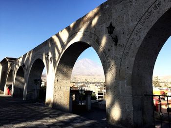 View of buildings in town against sky