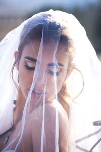 Close-up of bride wearing veil