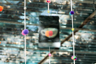 Close-up of decorations hanging outdoors