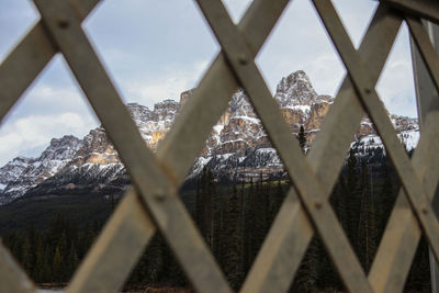 Fence against sky during winter