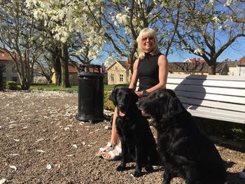 Portrait of woman with dogs