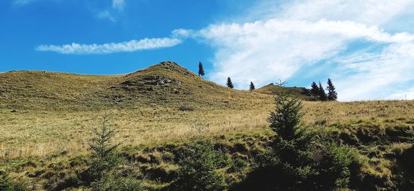 Low angle view of land against sky