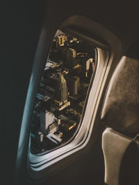 View of cityscape through airplane window