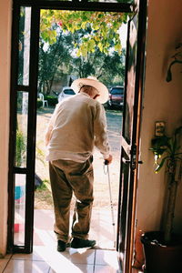 Rear view of man standing outdoors