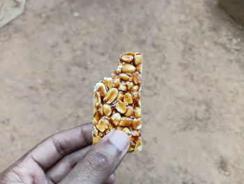 Close-up of hand holding food