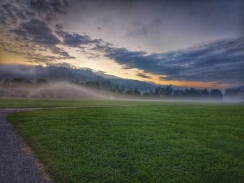 Scenic view of field against sky