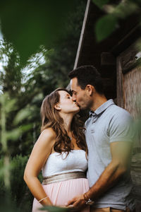 Young couple kissing outdoors