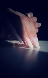 Close-up of hand holding mobile phone