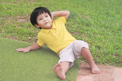 Full length of baby girl on field