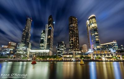 Low angle view of illuminated city at night