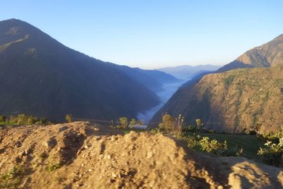 Scenic view of mountains against clear sky