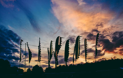 Low angle view of cloudy sky at sunset