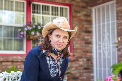 Portrait of beautiful woman wearing hat