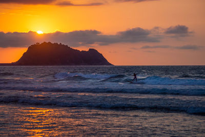 Scenic view of sea during sunset