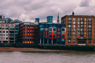 Buildings in city against sky