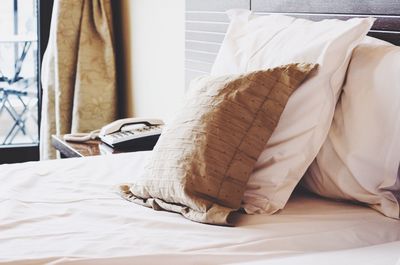 Close-up of blanket on bed at home