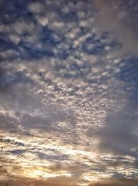 Low angle view of dramatic sky during sunset