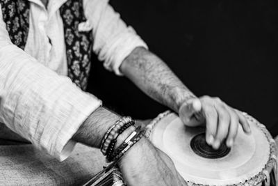 Close-up of man working on wood