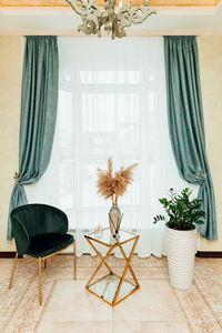 Turquoise curtain fabric in the interior