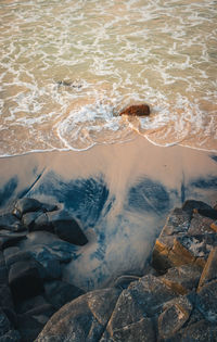 High angle view of rocks on beach