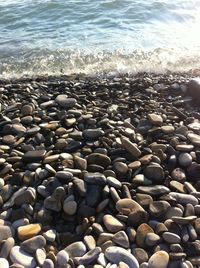 Close-up of pebbles on beach