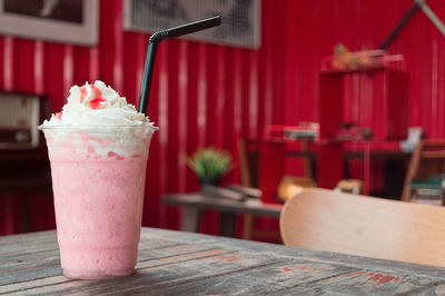 Close-up of smoothie in glass on table