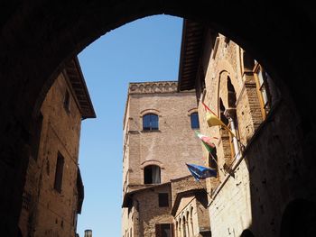 Low angle view of bell tower against sky