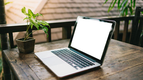 Close-up of laptop on table