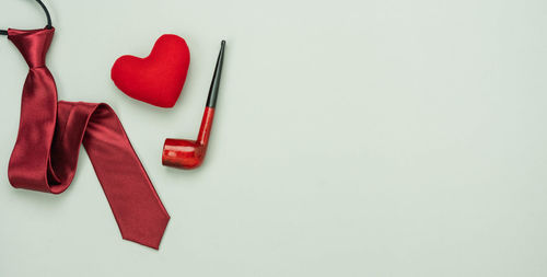 High angle view of heart shape over white background