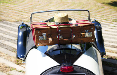 Close-up of vintage car on field